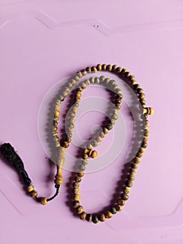 Wooden prayer beads are commonly used by Muslims for dhikr