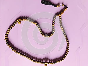 Wooden prayer beads are commonly used by Muslims for dhikr photo