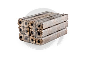 Wooden pressed briquettes Pini Kay from biomass. photo