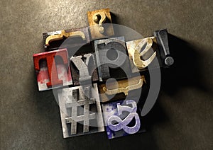 Wooden printing blocks form word 'Type'. Graphic look at type an