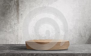 wooden product display podium with white concrete wall at background. wooden stage on grey marble table.