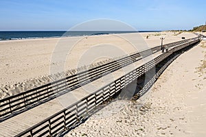 Wooden promenade along the Baltic Sea coas. Yantarny. Kaliningrad region. Russia