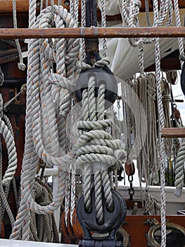 Wooden pulleys and ropes on vintage sailing boat