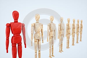 Wooden puppet, stands at the head of society. Leadership concept, winner, leader, influencer. Copy space, 3D illustration, 3D