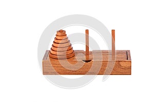 Wooden puzzle tower of hanoi over white background