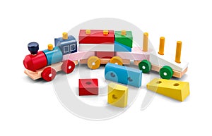 Wooden puzzle toy train with colorful blocs isolated on white