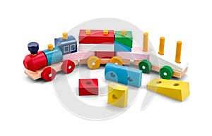 Wooden puzzle toy train with colorful blocs over white