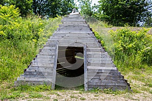 Wooden pyramid as a tent accommodation