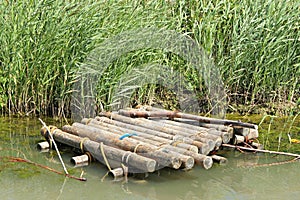 Wooden raft in the water