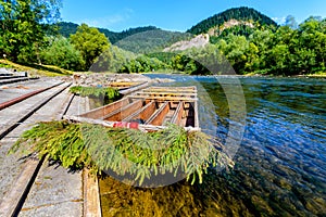 Wooden rafting boats on shore of Dunajec river, Pieniny Mountains