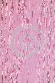Wooden rake. Texture, background. Wooden plank on the wall of the house.,Pink