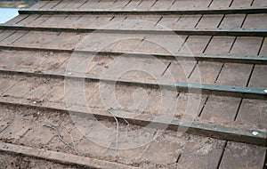 Wooden ramp on the playground with non-slip crossbeams. used to ascend up an inclined plane. horses have a similar one when enteri