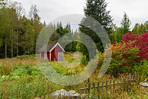 Wooden red cottage houses in Sweden