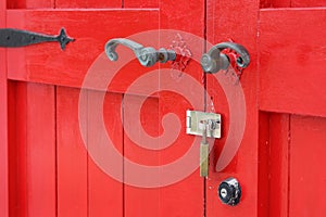 Wooden red door with handle