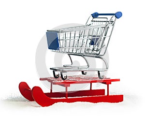 Wooden red sled with shopping cart