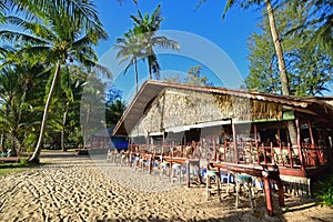 Wooden resort bar restaurant with traditional architecture, fine sand of Pulau Sibu island, Mersing District, Johor, Malaysia