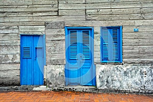 Wooden retro blue door and widows