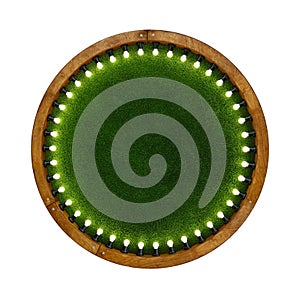 Wooden ring light frame with green grass backdrop