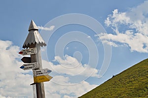 Wooden road sign in the mountains in Bieszczady, in the Bieszczady National Park