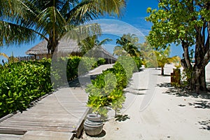 Wooden road to bungalos at the tropical island