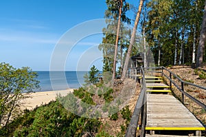 Wooden road to sandy beach of Saulkrasti town in Latvia.