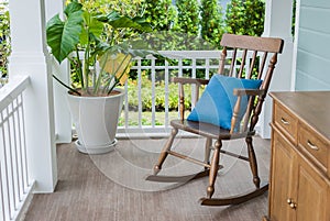 Wooden rocking chair on front porch