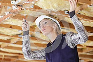 wooden roof beams and hole in ceiling