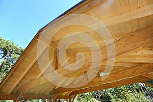 Wooden roof construction of outdoor carport