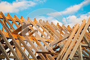 Wooden roof construction, symbolic photo for home, home construction, and home financing