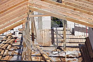 Wooden roof frame for a house in construction.