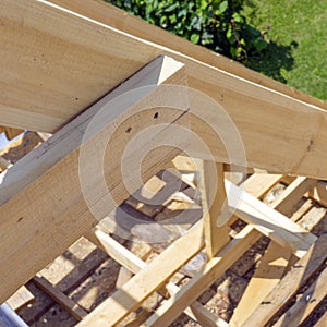 Wooden roof with rafter style framing. Close up