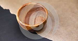 wooden round bowl on the table