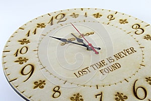 Wooden round wall watch - clock isolated on white background. Manage your time