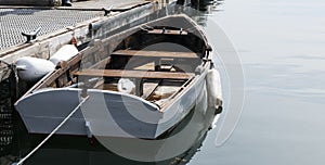 Wooden rowboat docked in Bar Harbor Maine