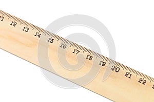 Wooden ruler macro shot isolated on white background