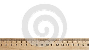 Wooden ruler with measuring length markings in centimeters isolated on white, top view