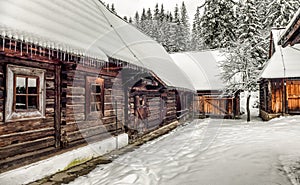 Wooden rural cottage in snowy village in winter