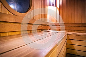 Wooden russian bathhouse sauna benches in hospital recreational room,