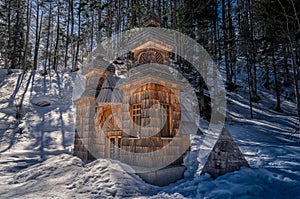 Wooden Russian orthodox chapel dedicated to Saint Vladimir on a sunny winter day