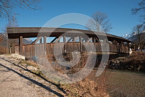 Wooden rustic bridge over loisach river, garmisch-partenkirchen