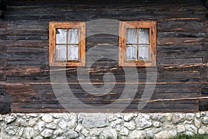 Wooden, rustic window in old cottage, Vlkolinec, Slovakia