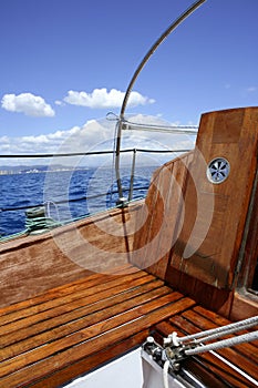 Wooden sailboat boat deck blue sky ocean sea