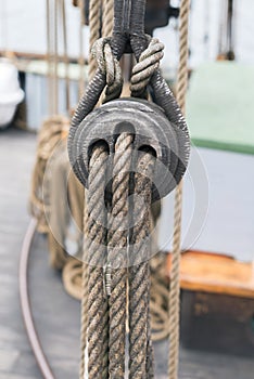 Wooden sailboat pulleys and ropes detail