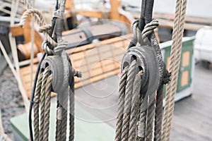 Wooden sailboat pulleys and ropes detail