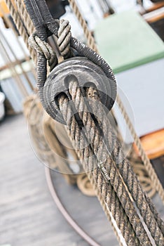 Wooden sailboat pulleys and ropes detail