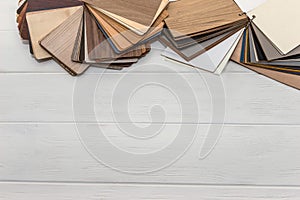 Wooden sampler in fan on light background