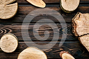 Wooden sawcut frame for blog on rustic wooden background top view mockup