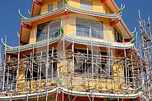 Wooden scaffold around religious building