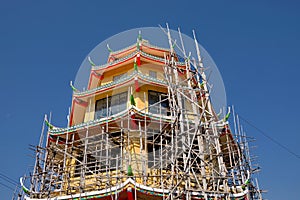 Wooden scaffold around religious building