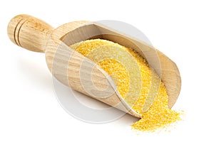 Wooden scoop with corn flour photo